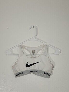 Women's Nike Pro White Sports Bra with Black Swoosh